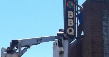 dino bbq sign