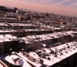 Snowy rooftops by Dennis Gronim