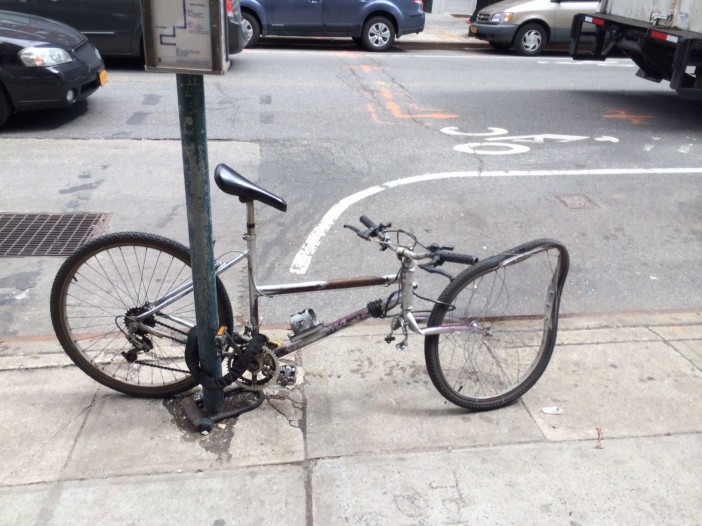 Damaged bike on 5th Ave, by neighbor Jay